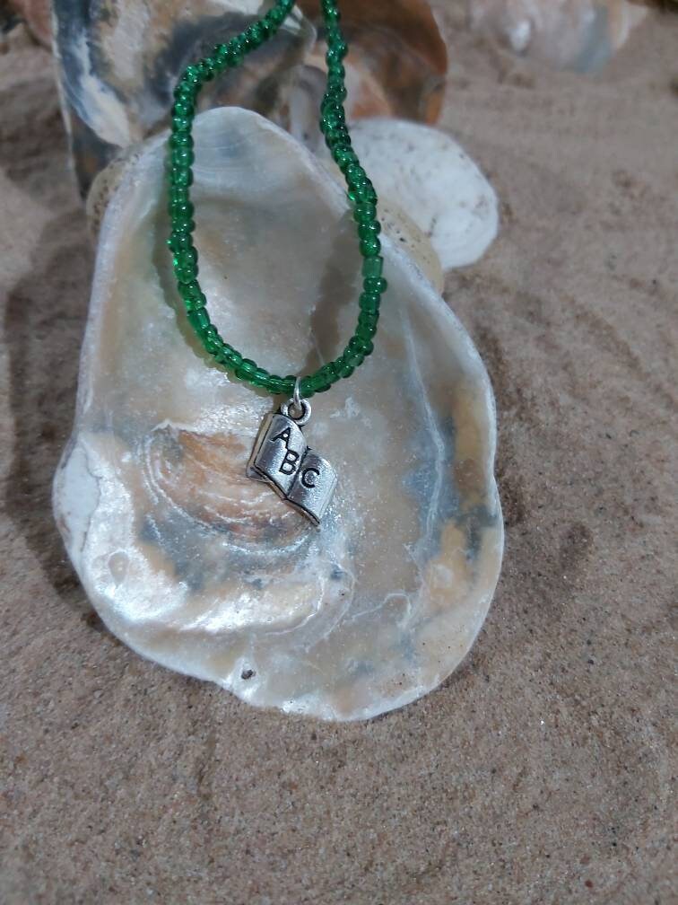 book charm on a dainty seedbead anklet. Teacher gift