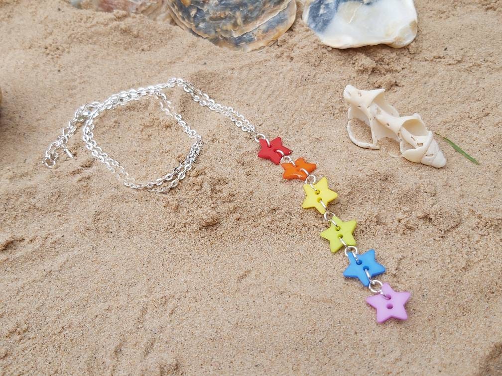 Kawaii, harajuku Rainbow star button dangle necklace with silver plated adjustable chain.