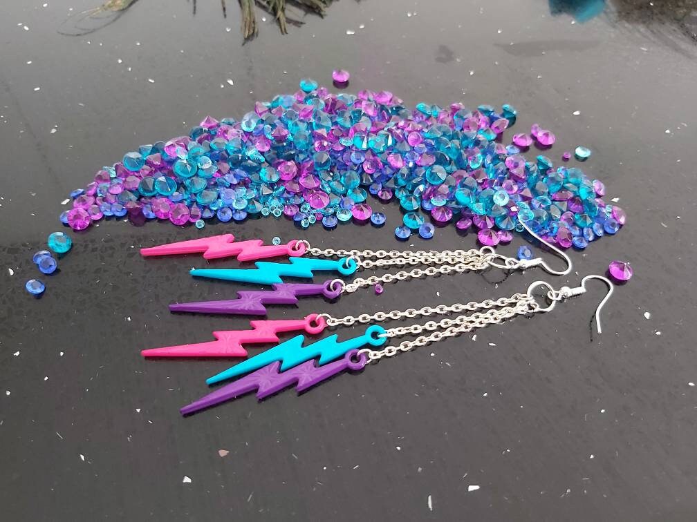 Triple drop Lightning bolts . Pink, purple and blue .