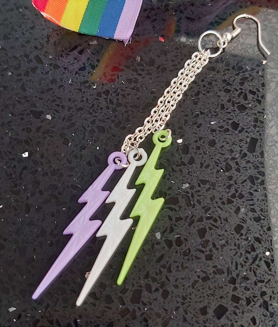 Genderqueer earrings pride flag colours.purple, white and green .