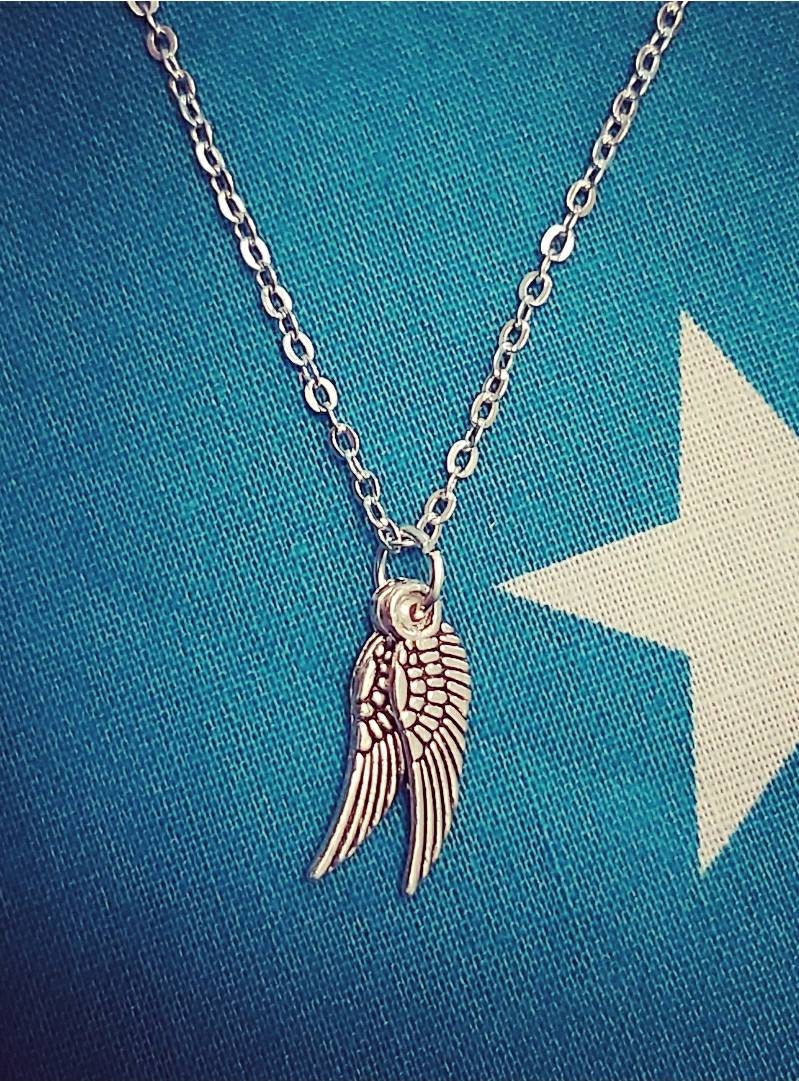 Angel wings necklace and earrings.