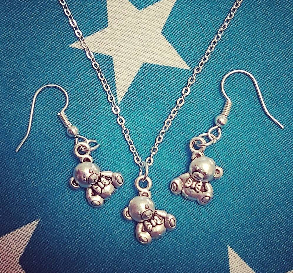 Teddy bear necklace and earrings.