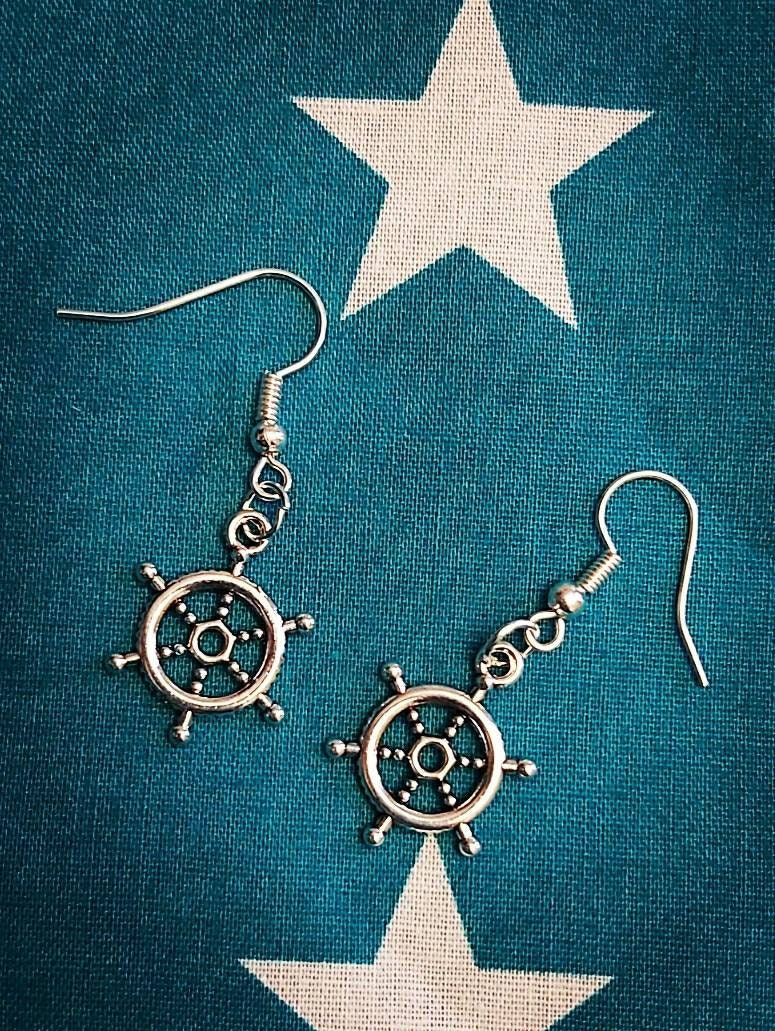 Ships wheel necklace and earrings.
