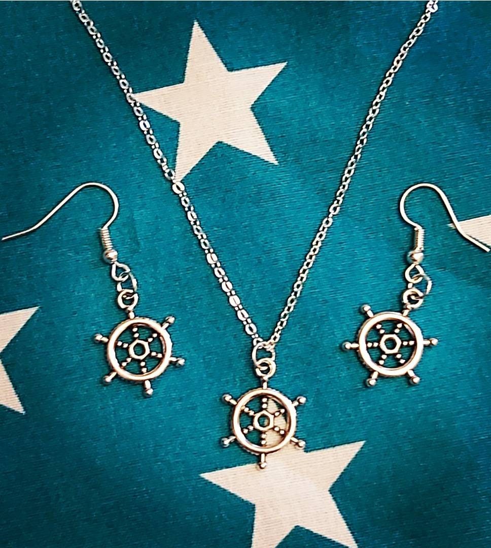 Ships wheel necklace and earrings.