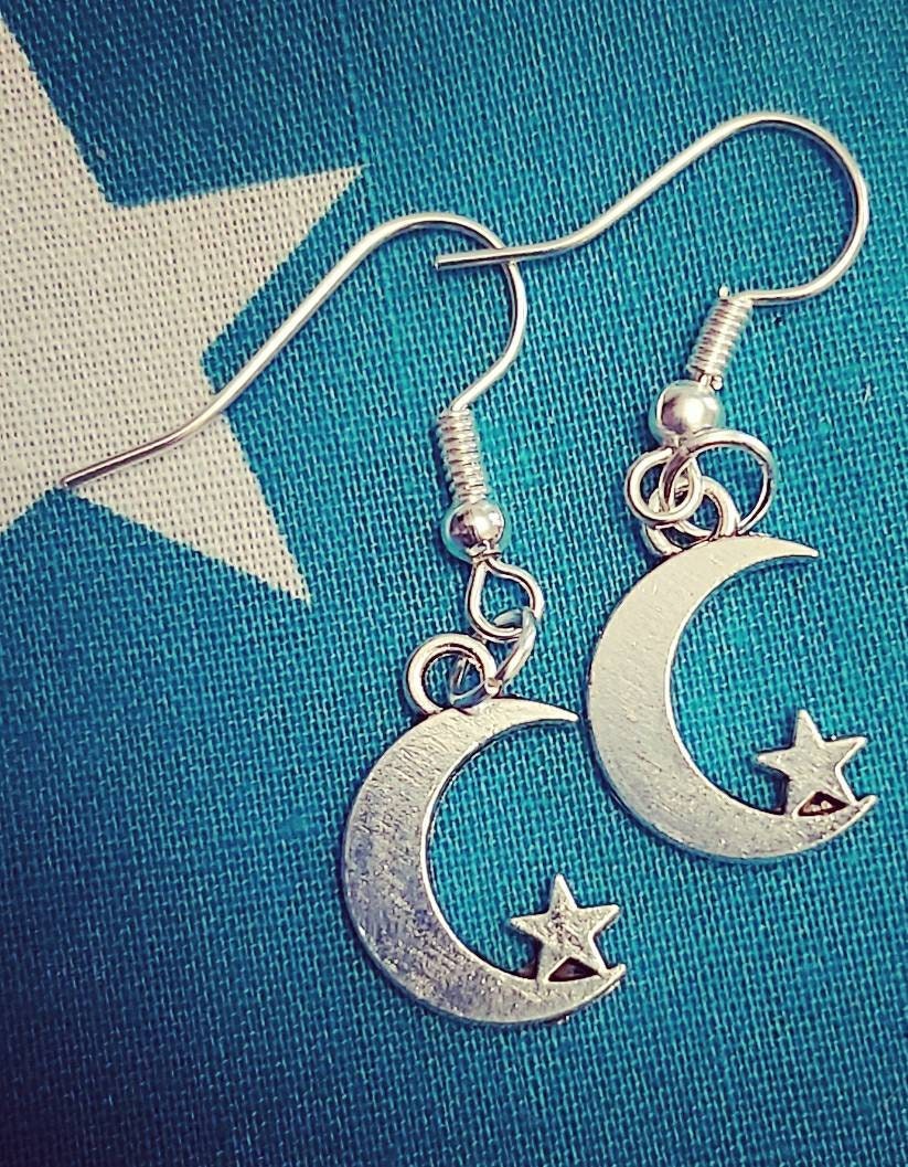 moon and star necklace and earrings.