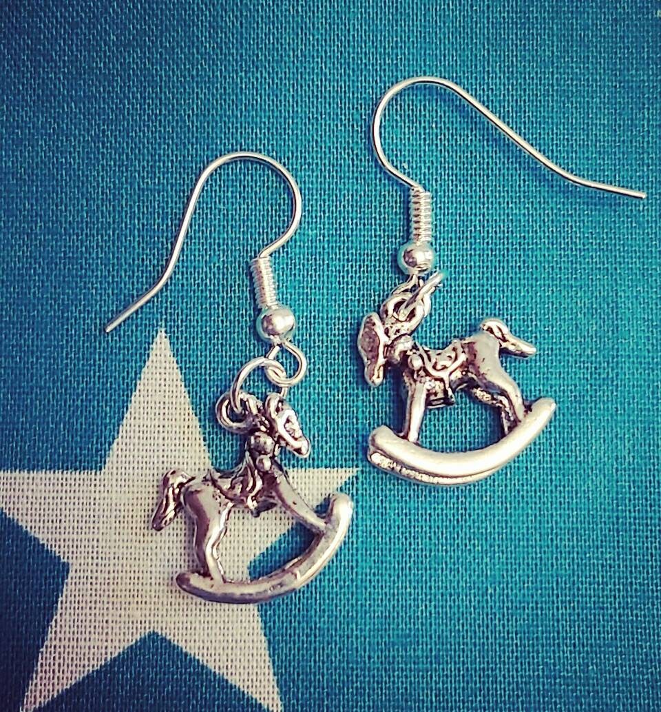 Rocking horse necklace and earrings.