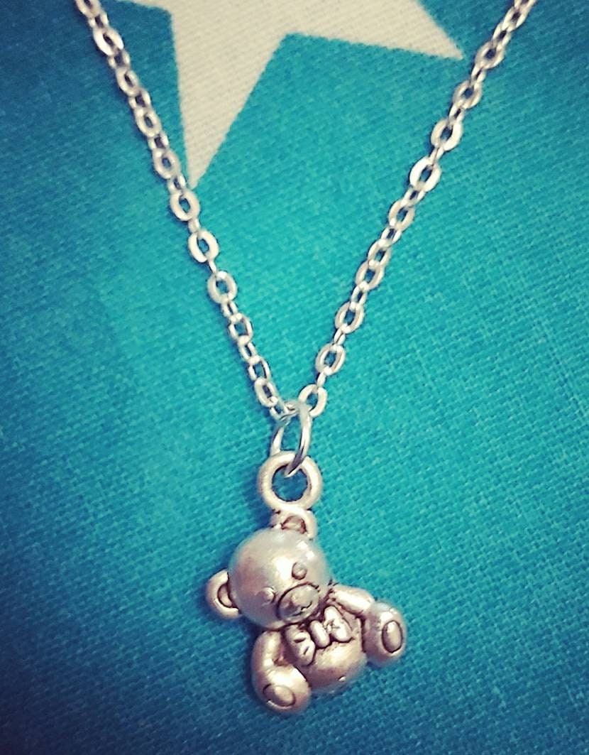 Teddy bear necklace and earrings.